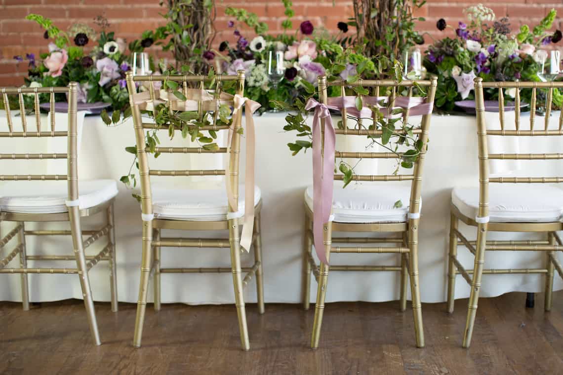 Gold Wedding Chairs with Purple and Pink Ribbons 