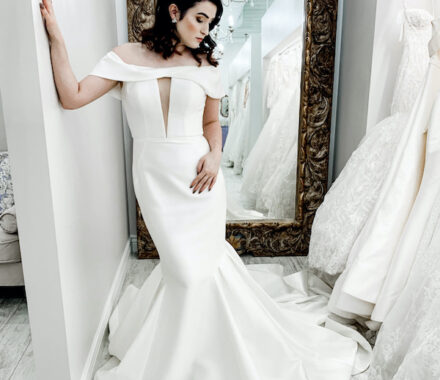 Mimi's Couture Bridal Kansas City Wedding Dress lean