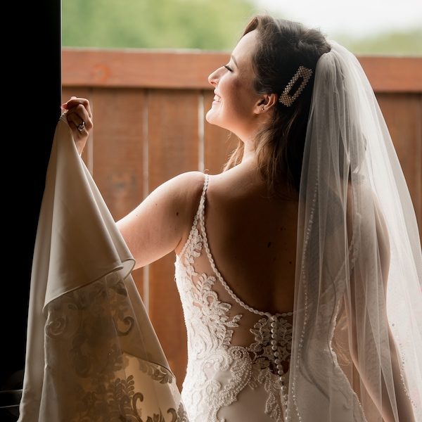 Angela Needs Shipps Kansas City Wedding Photography WedKC Dress Back Bride