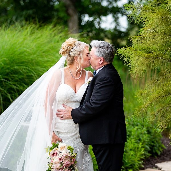 Angi's Art Kansas City Wedding Photography WedKC Bride Groom Kiss Bouquet