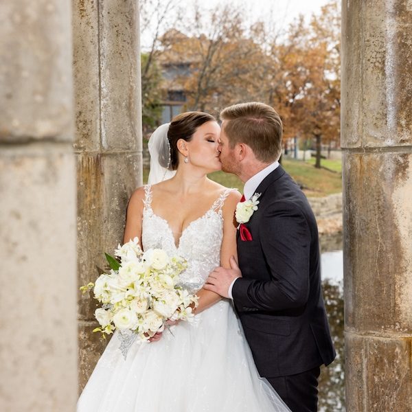 Angi's Art Kansas City Wedding Photography WedKC Columns Bride Bouquet Kiss