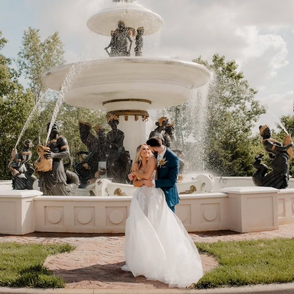 Avent Orangery Kansas City Wedding Venue WedKC Fountain Bride Groom