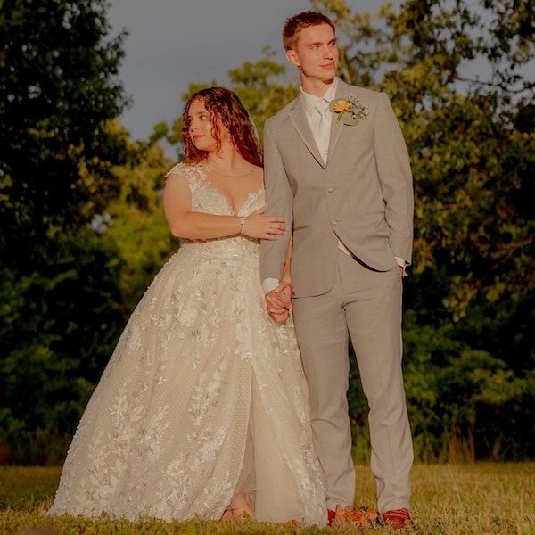 Cline's Custom Alterations Kansas City Wedding Dress Outdoor Couple