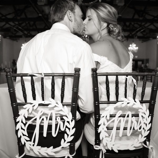 Erica Allen Photography Kansas City Wedding Photographer WedKC Couple Kiss Signs