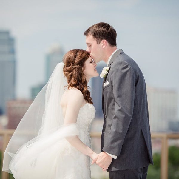 Events by Elle Wedding Planner Kansas City forehead kiss