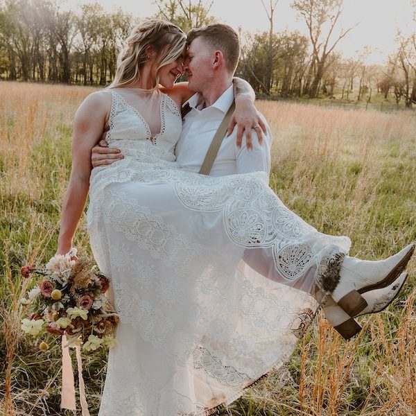 Lexi Rae Photography Kansas City Wedding Photographer WedKC Bride Groom Lift Flowers Bouquet Boots Dress