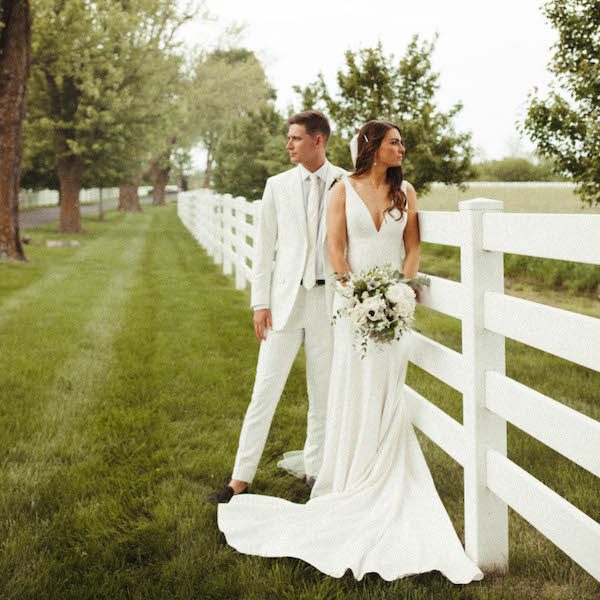 Lone Summit Ranch Kansas City Wedding Venue WedKC Fence Bride Groom White Bouquet