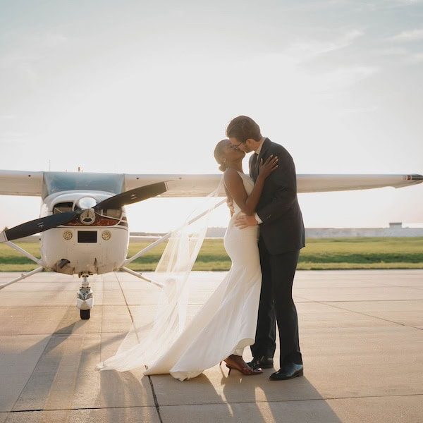 Nichole Storey Photography Kansas City Wedding Photographer WedKC Kiss Sunset Plane