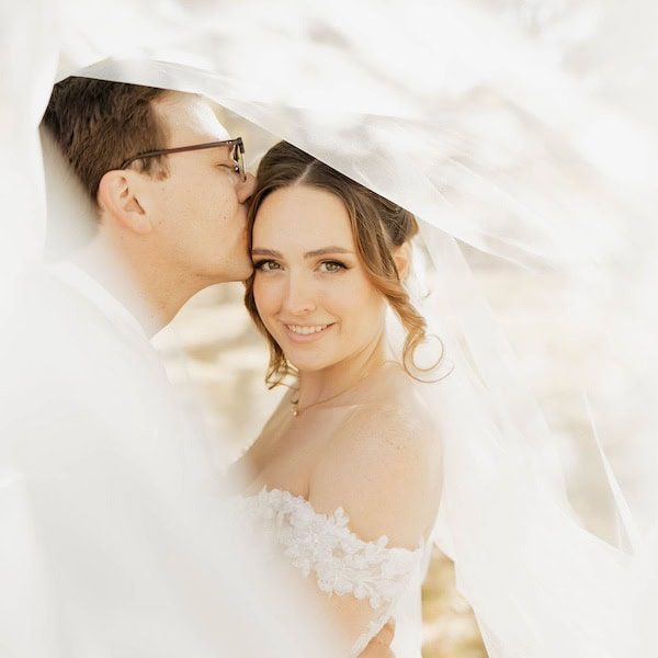 Nichole Storey Photography Kansas City Wedding Photographer WedKC Veil Bride Kiss