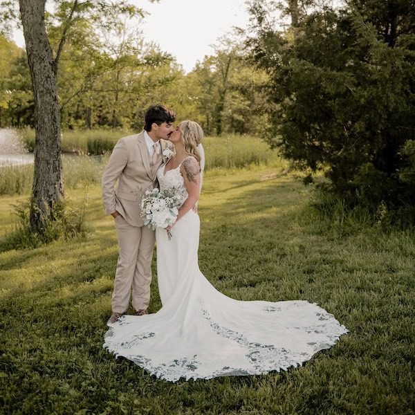Piper Reese Kansas City Wedding Photography Bride Dress Kiss