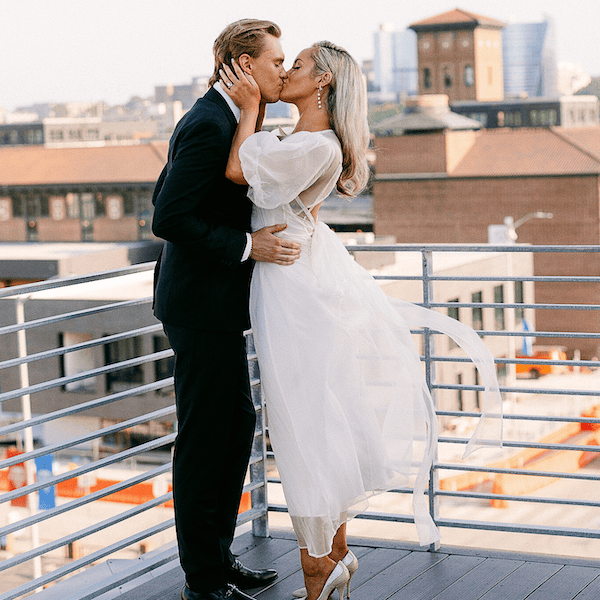 The Bardot Kansas City Wedding Venue WedKC Bride Groom Skyline Kiss