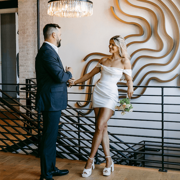 The Bardot Kansas City Wedding Venue WedKC Bride Groom Stairs Chandelier
