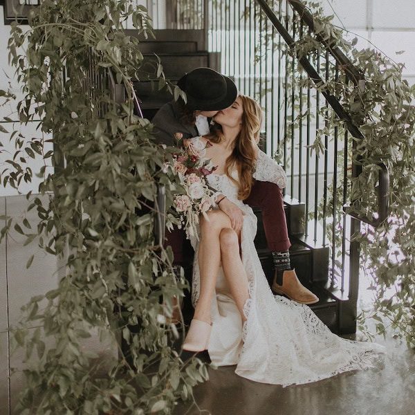 The Delaware Events Kansas City Wedding Venue WedKC Couple Kiss Stairs