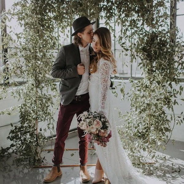 The Delaware Events Kansas City Wedding Venue WedKC Groom Bride Kiss
