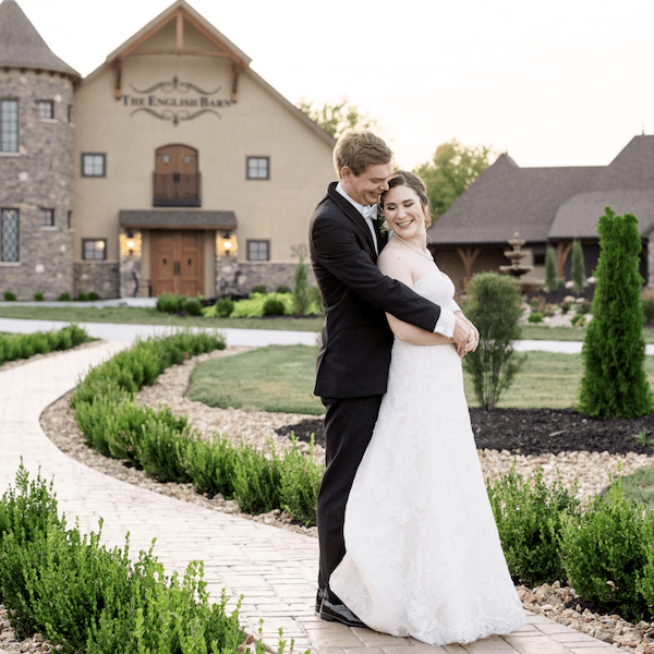 The English Barn Kansas City Wedding Venue WedKC Couple Sidewalk