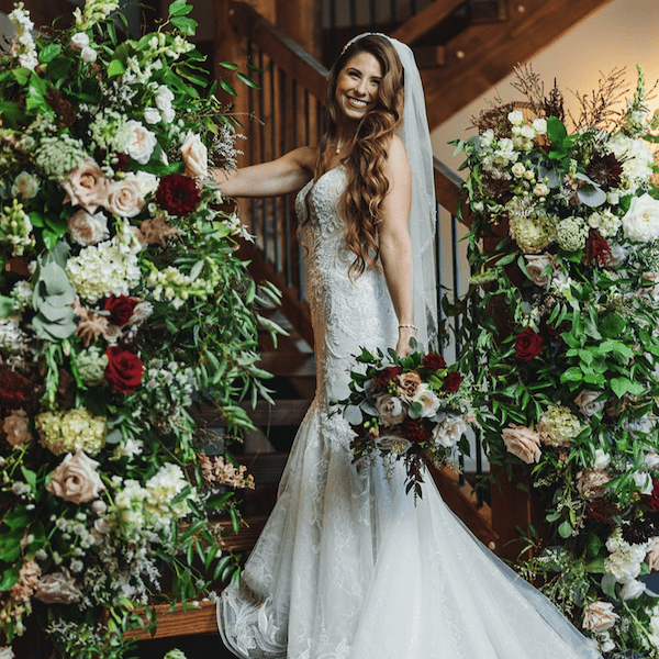 The English Barn Kansas City Wedding Venue WedKC Floral Arrangement Stair Bride