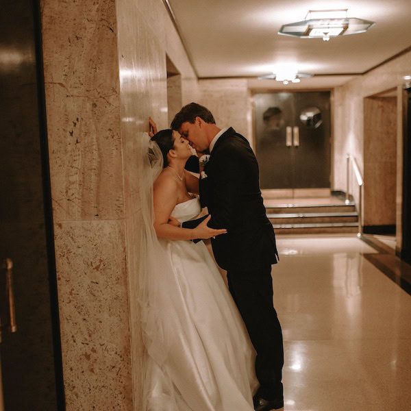 The Little Theatre at The Kansas City Convention Center Wedding WedKC Hallway Kiss
