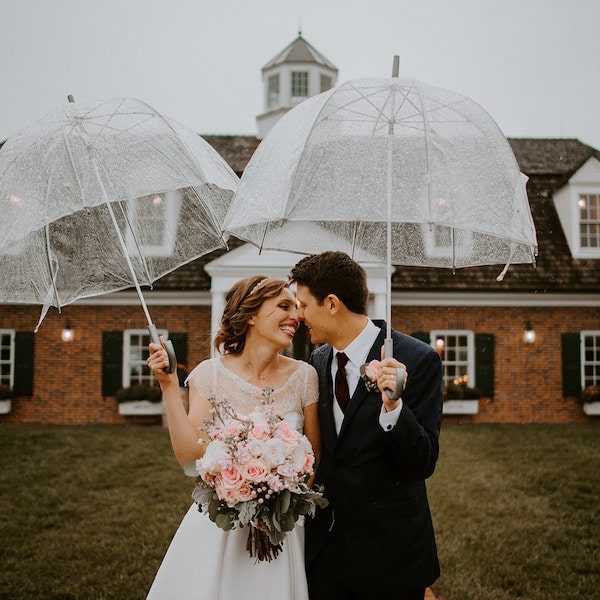 ThirtyOne-Thirty Events Kansas City Wedding Planner WedKC Bride Groom Umbrellas Bouquet