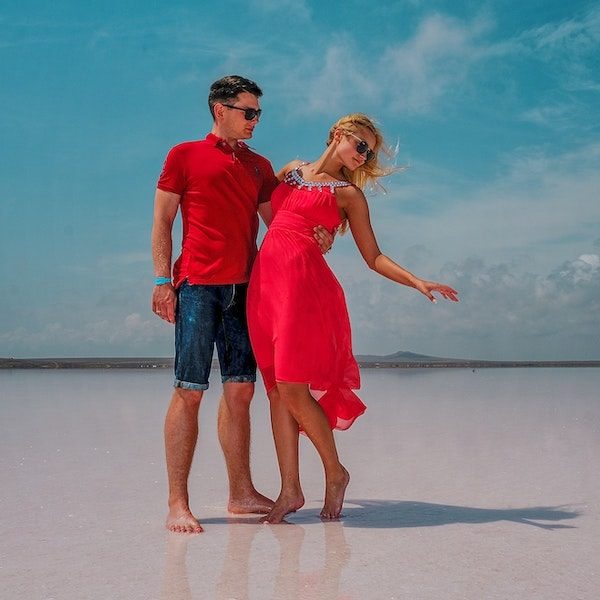 Travelicious Group Kansas City Wedding Travel Agent Specialist WedKC Couple on Beach