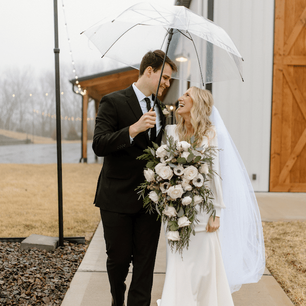 Vineyard at J Creek Kansas City Wedding Venue WedKC Bride Groom Umbrella